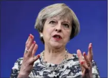  ?? STEFAN ROUSSEAU — PA VIA AP ?? Britain’s Prime Minister Theresa May speaks during a campaign visit to Norwich, England, Wednesday.