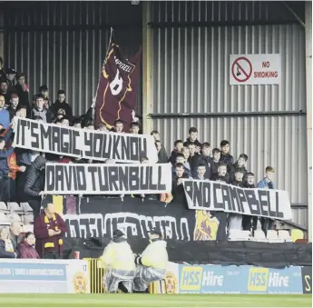  ??  ?? 0 Motherwell fans displayed a banner in appreciati­on of their highly-rated young players David Turnbull and Allan Campbell during their home match against Dundee on Saturday. Nineteenye­ar-old Turnbull duly vindicated their faith in him by scoring twice in their 4-3 victory, including a rasping shot in the last minute which clinched the three points.