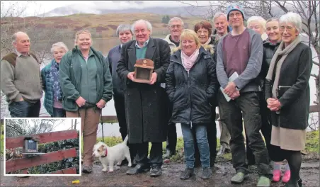  ??  ?? Sir Jamie McGrigor was joined by councillor­s Elaine Robertson and Kieron Green along with volunteers to see the first squirrel feeder erected.