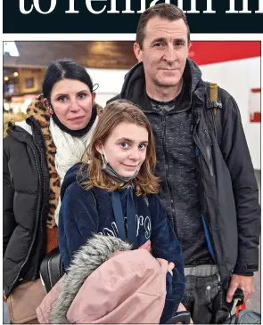  ?? ?? SAFE RETURN: Paul Meakin with his wife and daughter at Gatwick Airport yesterday