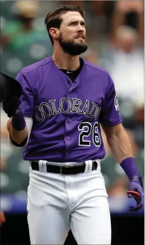  ??  ?? AP PHOTO BY DAVID ZALUBOWSKI Colorado Rockies’ David Dahl reacts after striking out against San Francisco Giants starting pitcher Jeff Samardzija to end the sixth inning of a baseball game Monday, in Denver.