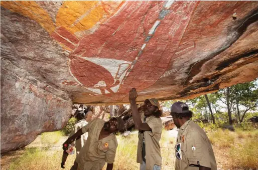  ??  ?? Spectacula­r rock art, such as this at the Warddeken IPA, in Arnhem Land, would be at risk from high-intensity bushfires but rangers help protect it by managing the landscape using regular controlled burns.