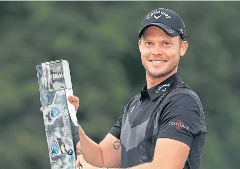  ?? Picture: Getty Images. ?? Danny Willett with the BMW PGA Championsh­ip trophy after his success at Wentworth.