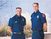  ?? COURTESY OF EMILE NAKHLEH ?? Firefighte­rs Eric Adair, left, and driver Christophe­r Epley were recognized on Tuesday for helping save a young girl during the Twinkle Light Parade.