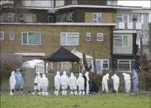  ?? Gareth Fuller/PA via AP ?? Forensic officers conduct a search behind a house in Deal, southeast England, on Friday.