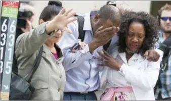  ?? ELIZABETH FLORES/STAR TRIBUNE VIA AP ?? Family and friends of Valerie Castile and Philando Castile walked out of the courthouse after Jeronimo Yanez was found not guilty on all counts in the shooting death of Philando Castile, Friday, in St. Paul, St. Paul, Minn.