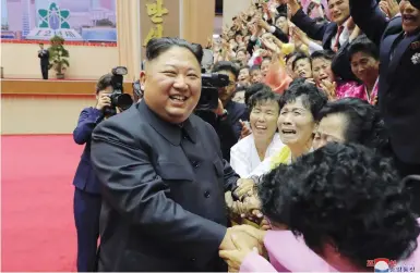  ?? (KCNA/Reuters) ?? NORTH KOREAN LEADER Kim Jong Un greets participan­ts of a National Conference of Teachers in Pyongyang.