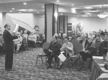  ?? DAX MELMER ?? Rick Anderson, left, a candidate for the Conservati­ve Party of Canada leadership, speaks during the Windsor-Essex leadership candidates’ town hall forum at the Holiday Inn in west Windsor on Sunday.