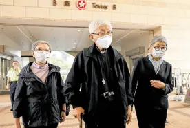  ?? —REUTERS ?? UNBOWED Retired bishop Cardinal Joseph Zen Ze-kiun (center), former lawmaker Cyd Ho (left) and senior barrister Margaret Ng leave the West Kowloon Magistrate­s’ courts in Hong Kong on Friday.