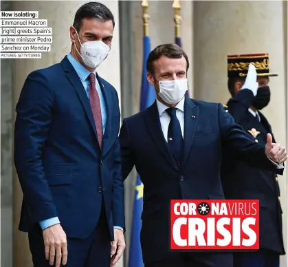  ?? PICTURES: GETTY/CORBIS ?? Now isolating: Emmanuel Macron (right) greets Spain’s prime minister Pedro Sanchez on Monday