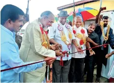  ??  ?? Northern Province Chief Minister C.V. Wigneswara­n and Tourism Developmen­t Minister John Amaratunga open the Comfort Centres for public use