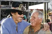  ?? AP 2009 ?? Richard Petty (left) and David Pearson combined for 63 finishes in which they finished first and second to each other. Pearson won 33 of the battles.