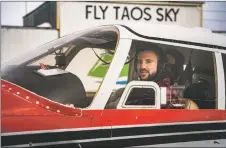  ?? ?? Ricky Carlini has been taking flying lessons for a a little over a year from flight instructor Michael McCann, owner of the flight school Fly Taos Sky.