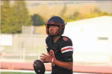  ?? Photos by Chace Bryson / Special to The Chronicle ?? James Logan junior QB Marcus Sanders completed nine passes for 241 yards and four TDs against Moreau Catholic.