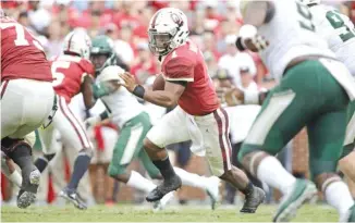  ?? BRETT DEERING/GETTY IMAGES ?? Oklahoma quarterbac­k Kyler Murray, who has been spectacula­r since stepping into Heisman Trophy winner Baker Mayfield’s shoes, goes up against a tough Texas defense.