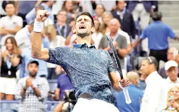  ?? — AFP photo ?? Serbia’s Novak Djokovic reacts after his win against Japan’s Kei Nishikori during the Men’s Singles Semi-Finals match at the 2018 US Open at the USTA Billie Jean King National Tennis Center in New York on September 7, 2018.