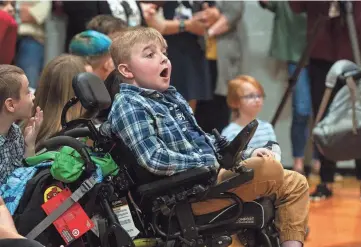  ?? PHOTOS BY ANGELINA ALCANTAR/NEWS SENTINEL ?? A student at Clinton Elementary School is shocked that an educator will be rewarded $25,000 from the National Institute for Excellence in Teaching by the Milken Family Foundation during a assembly in the gym in Clinton. on March 28.