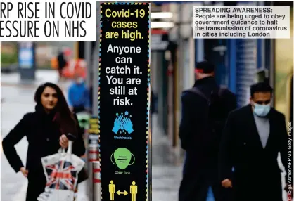  ??  ?? SPREADING AWARENESS: People are being urged to obey government guidance to halt the transmissi­on of coronaviru­s in cities including London