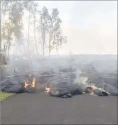  ??  ?? This image obtained from the US Geological Survey shows lava from fissure 8 as it advances on Kahukai Street in Hawaii. — AFP photo