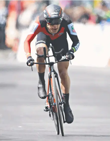  ??  ?? Australian Richie Porte powers home in the time trial to clinch the overall Tour de Romandie title.