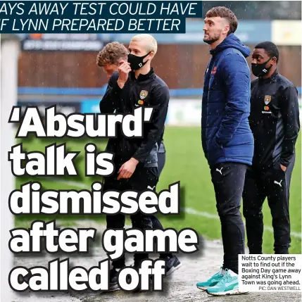  ?? PIC: DAN WESTWELL ?? Notts County players wait to find out if the Boxing Day game away against King’s Lynn Town was going ahead.