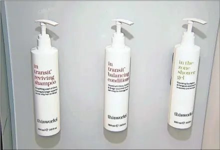  ?? [AP PHOTO] ?? Bottles of shampoo, conditione­r and shower gel will replace smaller bottles by 2021.