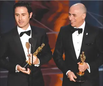  ?? Associated Press photo ?? Alan Barillaro, left, and Marc Sondheimer accept the award for best animated short film for “Piper” at the Oscars at the Dolby Theatre in Los Angeles.