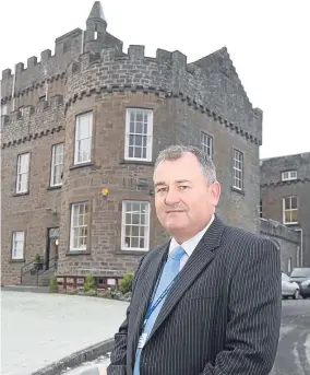  ??  ?? Governor Andy Hodge outside Castle Huntly prison.