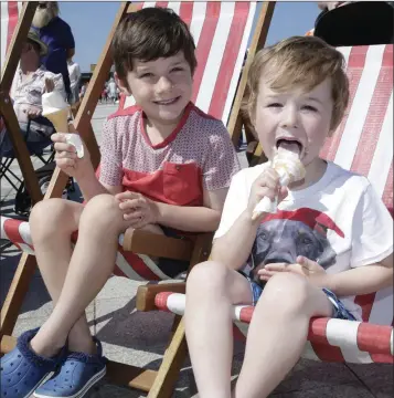  ??  ?? Christian and Jude Robinson at the Airport Police Fire Service Band concert on Bray Bandstand recently.