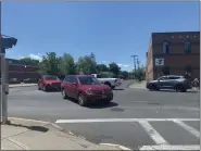  ?? TANIA BARRICKLO — DAILY FREEMAN ?? This photo, taken Thursday, June 25, 2020, in Midtown Kingston, N.Y., shows how vehicles crossing Broadway from Pine Grove Avenue (background) have to make a slight turn to proceed onto Grand Street.