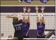  ?? JENNIFER FORBUS FOR THE MORNING JOURNAL ?? Midview’s Grace Milano sets the ball over the net toward the outstretch­ed arms of Vermilion’s Hallie Habermehl (1) and Kaitlin Colahan (15).