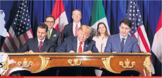  ??  ?? Les dirigeants mexica mexicain, américain et canadien lors de la signature officielle de l’ACEUM, le 30 novembre, en Argentine.