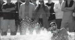  ?? K.C. ALFRED/TRIBUNE NEWS SERVICE ?? Adam Hadwin hits out of the sand at the Torrey Pines Golf Course in January.