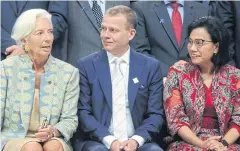  ??  ?? READY FOR ANYTHING: IMF director Christine Lagarde, left, Finland’s Finance Minister Petteri Orpo, centre, and Indonesia’s Finance Minister Sri Mulyani Indrawati.