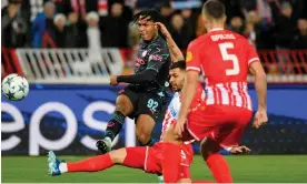  ?? Photograph: DeFodi Images/Getty Images ?? Micah Hamilton lashes home for his first goal in Manchester City’s senior team, putting them 1-0 up at Red Star Belgrade.