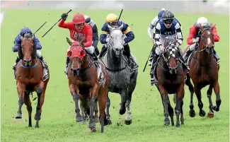  ??  ?? Kerrin McEvoy celebrates Redzel’s The Everest victory.