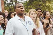  ??  ?? COME BACK SWINGIN’: Tracy Morgan, above with Jillian Bell, returns to the big screen as a coach in ‘Fist Fight.’