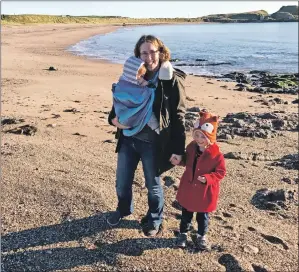  ??  ?? A veteran’s family enjoy a break at the beach.