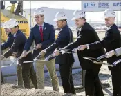  ?? ?? Hyundai Motor Group Metaplant America President/ CEO Oscar Kwon (center) is joined by VIPs during a groundbrea­king at Georgia Quick Start Training Center site near the plant Thursday.