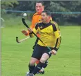  ??  ?? Shinty Allstar Victor Smith with Bruce Johnstone of the Taynuilt select.