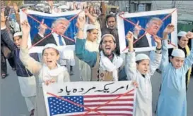  ?? AFP FILE ?? Pakistani demonstrat­ors take part in a protest against US aid cuts in Lahore earlier this year.