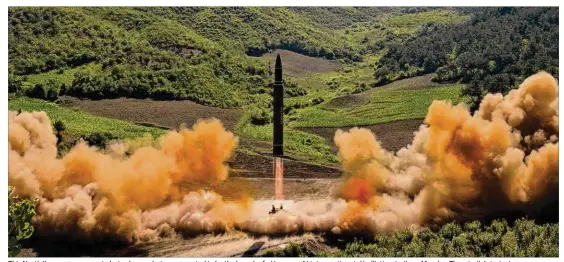  ?? KOREAN CENTRAL NEWS AGENCY / KOREA NEWS SERVICE VIA AP ?? This North Korean government photo shows what was reported to be the launch of a Hwasong-14 interconti­nental ballistic missile on Monday. The missile’s trajectory was deliberate­ly set “at the highest angle” to avoid harming neighborin­g countries, a...