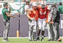  ?? AL DIAZ adiaz@miamiheral­d.com ?? A leg injury sustained by guard Jalen Rivers is the latest setback for the Hurricanes’ beleaguere­d offensive line.