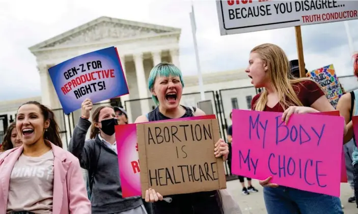  ?? Photograph: Jim Watson/AFP/Getty Images ?? Pro-choice demonstrat­ors protest in front of the US supreme court on 5 May.