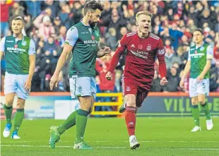  ?? SNS. ?? Gary Mackay-Steven celebrates after giving the Dons the lead.