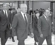  ?? AP/Thailand Ministry of Foreign Affairs ?? Defense Secretary James Mattis (center) arrives Wednesday with Thai Defense Minister Gen. Prawit Wongsuwan (right) for a Royal Cremation Ceremony for late Thai King Bhumibol Adulyadej in Bangkok, part of a five-day funeral after a year of mourning for...