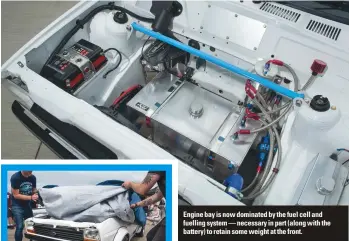  ??  ?? Engine bay is now dominated by the fuel cell and fuelling system — necessary in part (along with the battery) to retain some weight at the front.