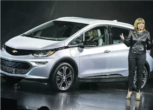  ?? ALEX WONG / GETTY IMAGES ?? GM chief executive Mary Barra introduces the all-electric Chevy Bolt in 2016 in Las Vegas. Barra has called for a U.S. federal mandate for zero emissions vehicles (ZEV) in order to accelerate adoption of the technology.