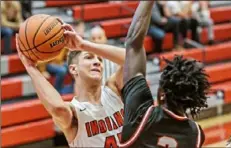  ?? For the Post-Gazette ?? Peters Township’s Jack Dunbar, left, averages 18 points per game and is one of the reasons the Indians received the No. 1 seed for the WPIAL Class 5A playoffs.