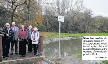  ?? 141114park_01 ?? New feature Friends group members Jim McLean, Ian and Helen McIndoe, Sam Bell and Margaret Wallace at the opening of the wildlife pond in 2014